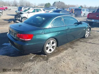 2008 BMW 3 Series 328i with VIN WBAWL13538PX18043, listed as a IAAI auction lot 41674323 with 122,787 mi miles. Bid and sale history available at carsss.com. Image 4.