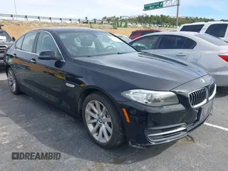 2014 BMW 5 Series 535i with VIN WBA5B1C54ED476763, listed as a IAAI auction lot 41590236 with 115,048 mi miles and . Bid and sale history available at DreamBid. Image 1.