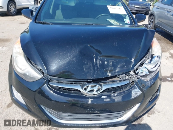 2013 Hyundai Elantra Limited with VIN KMHDH4AE9DU664514, listed as a IAAI auction lot 42031666 with 90,517 mi miles and . Bid and sale history available at DreamBid. Image 6.