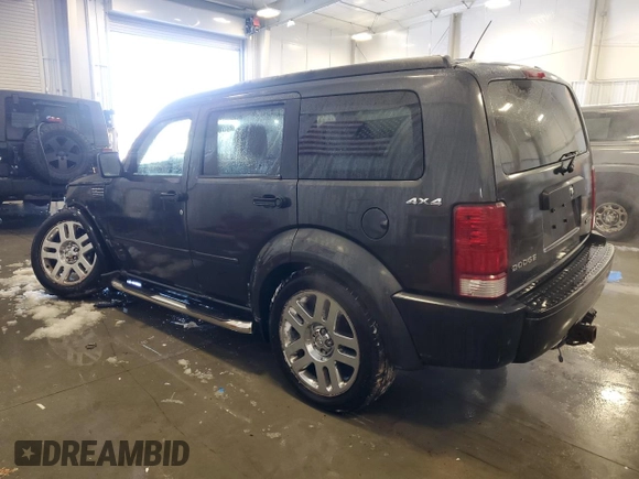 2010 Dodge Nitro SE with VIN 1D4PU2GK3AW144889, listed as a Copart auction lot 84314234 with 115,419 mi miles and Non Repairable. Bid and sale history available at DreamBid. Image 2.