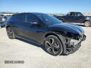 2022 Kia EV6 GT-Line with VIN KNDC4DLC4N5032040, listed as a Copart auction lot 71477664 with 77,085 mi miles and Salvage Title. Bid and sale history available at carsss.com. Image 4.