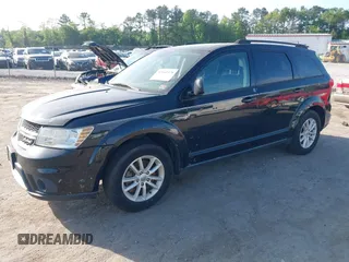 2016 Dodge Journey SXT with VIN 3C4PDDBGXGT179861, listed as a IAAI auction lot 42160578 with 161,887 mi miles. Bid and sale history available at carsss.com. Image 2.