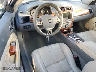 2008 Jaguar XK with VIN SAJWA44B485B23961, listed as a Copart auction lot 84052674 with 209,719 mi miles and Salvage Title. Bid and sale history available at carsss.com. Image 8.