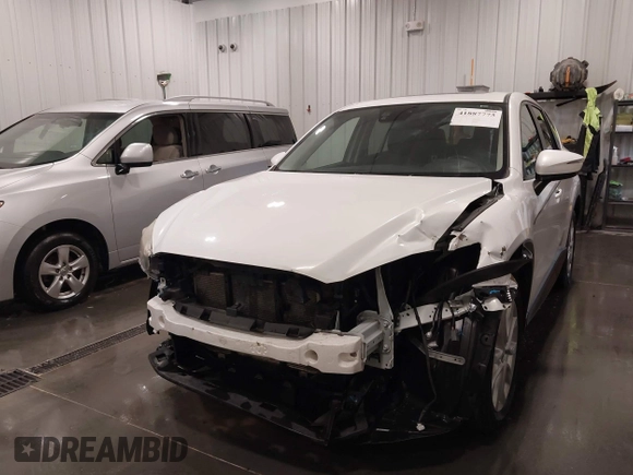 2015 Mazda CX-5 Grand Touring with VIN JM3KE4DY4F0495627, listed as a IAAI auction lot 41887773 with 130,421 mi miles. Bid and sale history available at carsss.com. Image 6.