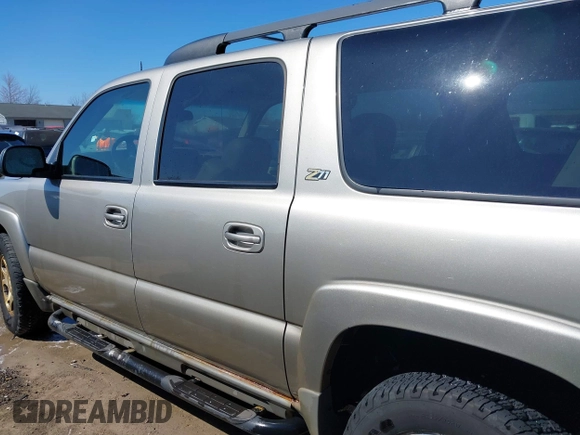 2003 Chevrolet Suburban Z71 with VIN 3GNFK16Z33G253479, listed as a IAAI auction lot 41871504 with 157,990 mi miles and . Bid and sale history available at DreamBid. Image 14.