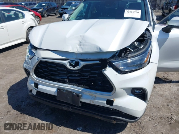 2023 Toyota Highlander L with VIN 5TDKDRBHXPS044812, listed as a IAAI auction lot 42026730 with 27,591 mi miles and . Bid and sale history available at DreamBid. Image 6.