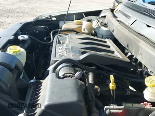 2015 Dodge Journey American Value z VIN 3C4PDCAB4FT720305, wystawiony jako IAAI lot #43284296 z przebiegiem 197 779 mil mil oraz . Historia ofert i sprzedaży dostępna na DreamBid. Obrazek 12.