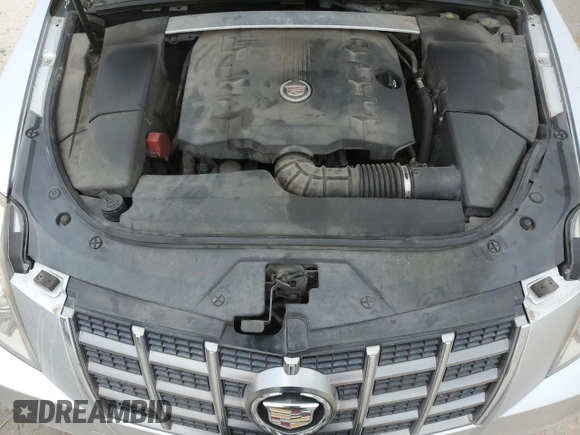 2012 Cadillac CTS Premium with VIN 1G6DP5E31C0120507, listed as a Copart auction lot 47694635 with 104,422 mi miles and Salvage title. Bid and sale history available at DreamBid. Image 13.