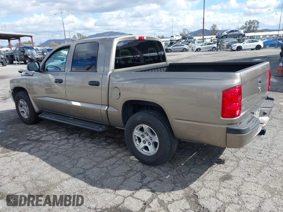 2007 Dodge Dakota SLT with VIN 1D7HE48N47S144084, listed as a IAAI auction lot 41798243 with 190,248 mi miles and . Bid and sale history available at carsss.com. Image 3.