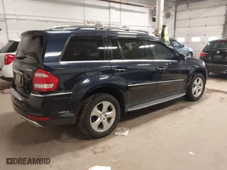 2011 Mercedes-Benz GL-Class GL 450 with VIN 4JGBF7BE4BA664500, listed as a IAAI auction lot 42099521 with 140,232 mi miles. Bid and sale history available at carsss.com. Image 4.