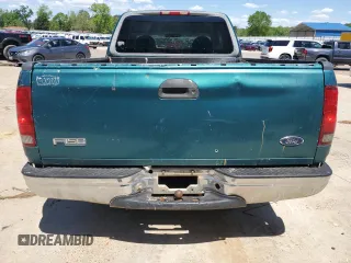 1998 Ford F-150 z VIN 1FTZX1768WNB23317, wystawiony jako Copart lot #52336895 z przebiegiem 288 431 mil mil oraz Szkoda całkowita • Salvage title. Historia ofert i sprzedaży dostępna na DreamBid. Obrazek 6.