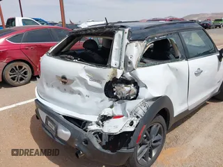 2013 MINI Paceman S ALL4 with VIN WMWSS7C51DWN51802, listed as a IAAI auction lot 41885786 with 96,386 mi miles and . Bid and sale history available at DreamBid. Image 6.