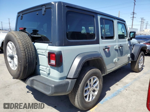 2023 Jeep Wrangler Sport S with VIN 1C4HJXDG5PW623797, listed as a Copart auction lot 66359625 with 16,518 mi miles and Salvage title. Bid and sale history available at DreamBid. Image 3.