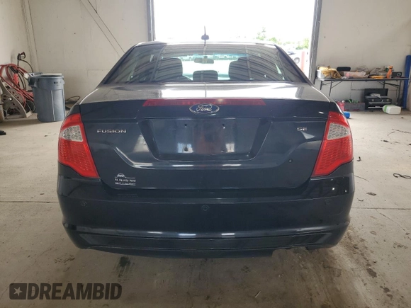 2012 Ford Fusion SE z VIN 3FAHP0HA0CR249551, wystawiony jako Copart lot #57858215 z przebiegiem 171 435 mil mil oraz Szkoda całkowita • Salvage title. Historia ofert i sprzedaży dostępna na DreamBid. Obrazek 6.