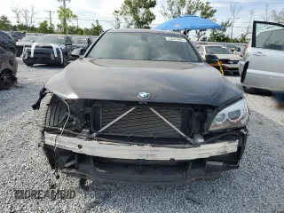 2014 BMW 7 Series 740Li with VIN WBAYE4C52ED138770, listed as a Copart auction lot 53647665 with 106,827 mi miles and Salvage title. Bid and sale history available at DreamBid. Image 5.