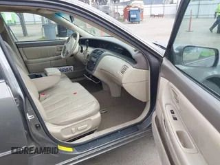 2004 Toyota Avalon XL with VIN 4T1BF28B04U365099, listed as a IAAI auction lot 41500378 with 208,797 mi miles and . Bid and sale history available at DreamBid. Image 5.