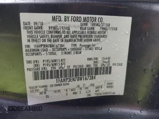 2011 Ford Focus S with VIN 1FAHP3EN7BW167384, listed as a IAAI auction lot 41687933 with 153,124 mi miles. Bid and sale history available at carsss.com. Image 9.