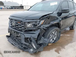 2023 Honda Passport TrailSport with VIN 5FNYF8H67PB006933, listed as a IAAI auction lot 41597859 with 34,145 mi miles and . Bid and sale history available at carsss.com. Image 6.