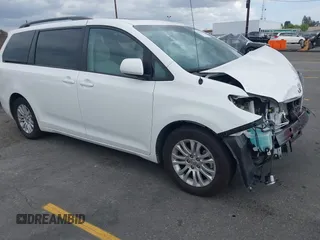 2014 Toyota Sienna XLE with VIN 5TDYK3DCXES470852, listed as a IAAI auction lot 42053266 with 48,512 mi miles. Bid and sale history available at carsss.com. Image 1.