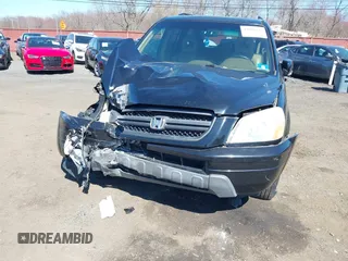 2005 Honda Pilot EX-L with VIN 5FNYF18555B043104, listed as a IAAI auction lot 41888235 with 127,781 mi miles. Bid and sale history available at carsss.com. Image 6.