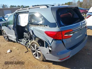 2023 Honda Odyssey Touring with VIN 5FNRL6H84PB005208, listed as a IAAI auction lot 41374452 with 60,288 mi miles and . Bid and sale history available at DreamBid. Image 3.