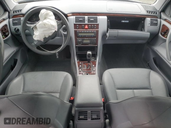 2002 Mercedes-Benz E-Class with VIN WDBJF82J62X063720, listed as a Copart auction lot 84763074 with 0 mi miles and Salvage Title. Bid and sale history available at carsss.com. Image 8.