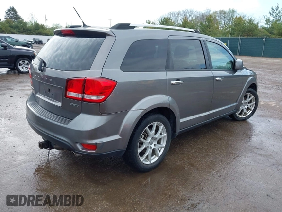 2012 Dodge Journey Crew z VIN 3C4PDCDG9CT146593, wystawiony jako IAAI lot #42127303 z przebiegiem 137 861 mil mil oraz . Historia ofert i sprzedaży dostępna na DreamBid. Obrazek 4.