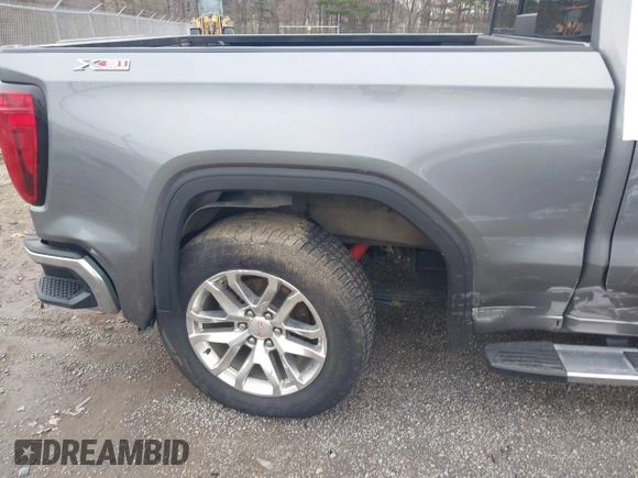 2021 GMC Sierra 1500 SLT z VIN 3GTU9DET8MG413416, wystawiony jako IAAI lot #41935465 z przebiegiem 70 547 mil mil oraz . Historia ofert i sprzedaży dostępna na DreamBid. Obrazek 17.