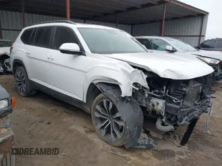 2022 Volkswagen Atlas SE z VIN 1V2JP2CA1NC556418, wystawiony jako IAAI lot #41490986 z przebiegiem 70 714 mil mil oraz . Historia ofert i sprzedaży dostępna na DreamBid. Obrazek 1.