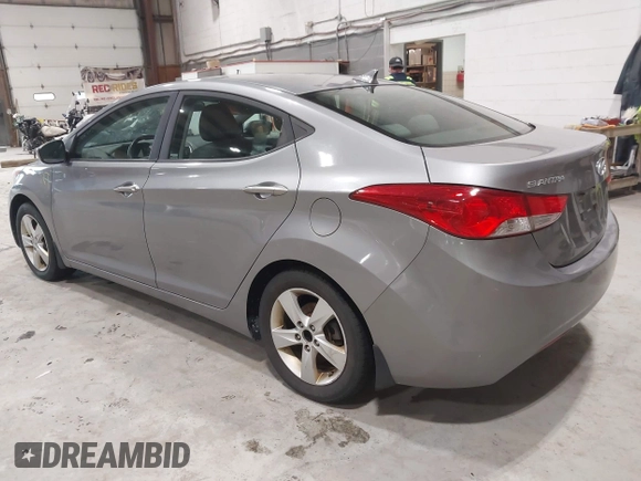 2012 Hyundai Elantra GLS z VIN KMHDH4AE6CU361222, wystawiony jako IAAI lot #42467636 z przebiegiem 176 795 mil mil oraz . Historia ofert i sprzedaży dostępna na DreamBid. Obrazek 3.