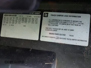 2005 Chevrolet Silverado 1500 Work Truck z VIN 2GCEK19V851367356, wystawiony jako IAAI lot #41448496 z przebiegiem 185 625 mil mil oraz . Historia ofert i sprzedaży dostępna na DreamBid. Obrazek 9.