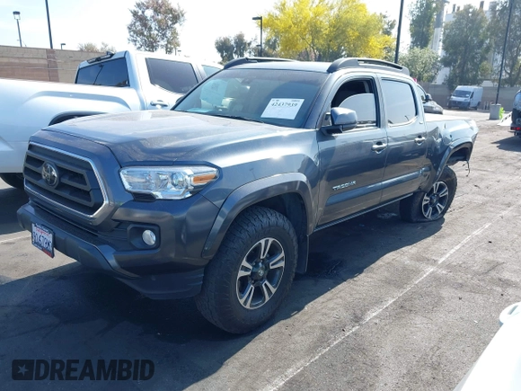 2022 Toyota Tacoma SR5 z VIN 3TMBZ5DN5NM036322, wystawiony jako IAAI lot #42437939 z przebiegiem 77 805 mil mil oraz . Historia ofert i sprzedaży dostępna na DreamBid. Obrazek 18.
