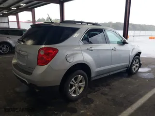 2013 Chevrolet Equinox LT with VIN 2GNFLPE32D6160883, listed as a IAAI auction lot 40447930 with 141,131 mi miles. Bid and sale history available at carsss.com. Image 4.