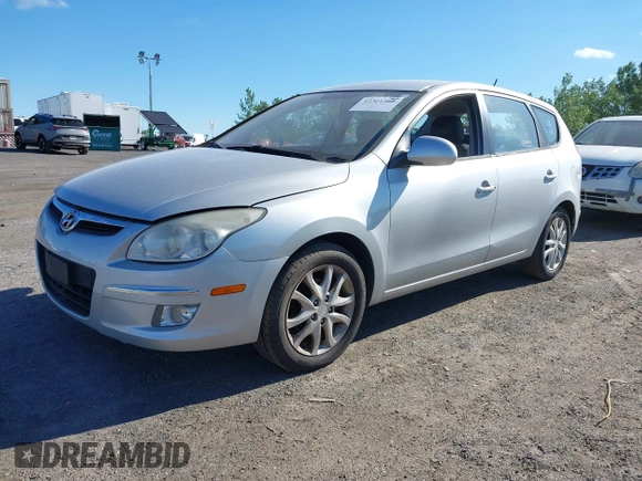 2009 Hyundai Elantra Touring z VIN KMHDC86E99U033025, wystawiony jako IAAI lot #42301392 z przebiegiem 154 455 mil mil oraz . Historia ofert i sprzedaży dostępna na DreamBid. Obrazek 2.