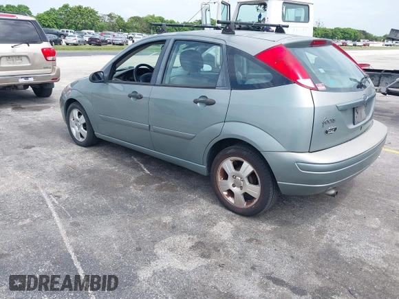 2004 Ford Focus with VIN 3FAFP37Z74R103228, listed as a IAAI auction lot 42658143 with 90,519 mi miles and . Bid and sale history available at DreamBid. Image 3.