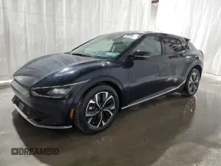 2024 Kia EV6 Wind z VIN KNDC34LA4R5205417, wystawiony jako Copart lot #59204615 z przebiegiem 31 048 mil mil oraz Czysty tytuł • Clean title. Historia ofert i sprzedaży dostępna na DreamBid. Obrazek 1.