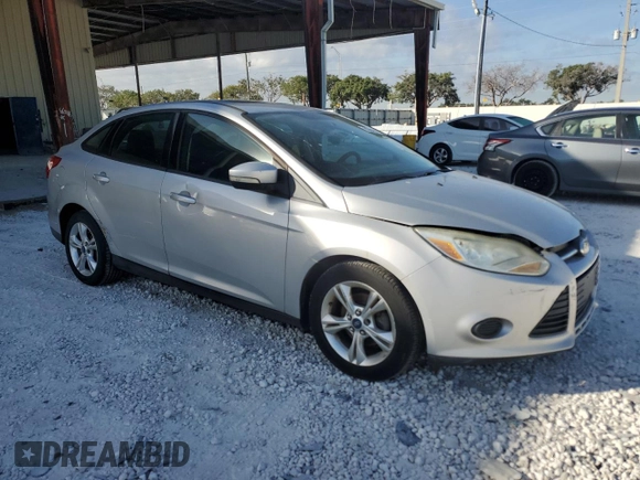2013 Ford Focus SE with VIN 1FADP3F25DL212152, listed as a Copart auction lot 83640484 with 180,314 mi miles and Clean title. Bid and sale history available at DreamBid. Image 4.