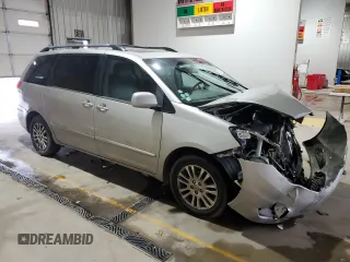 2010 Toyota Sienna XLE с VIN 5TDYK4CC9AS342961, выставлен на аукционе Copart как лот 60057105 с пробегом Не указан миль и Списание • Salvage title. История ставок и продаж доступна на DreamBid. Изображение 4.