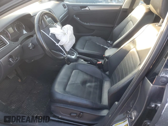 2014 Volkswagen Jetta SEL z VIN 3VWL17AJ6EM438176, wystawiony jako Copart lot #85081294 z przebiegiem 108 420 mil mil oraz Szkoda całkowita • Salvage title. Historia ofert i sprzedaży dostępna na DreamBid. Obrazek 7.