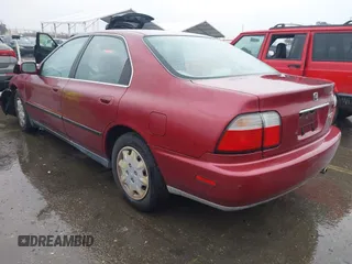 1996 Honda Accord LX with VIN 1HGCD5639TA011773, listed as a IAAI auction lot 41583086 with 148,439 mi miles and . Bid and sale history available at carsss.com. Image 3.