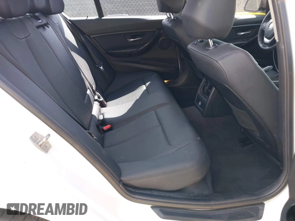 2015 BMW 3 Series 328i with VIN WBA3A5G51FNS89956, listed as a IAAI auction lot 42012575 with 121,246 mi miles. Bid and sale history available at carsss.com. Image 8.