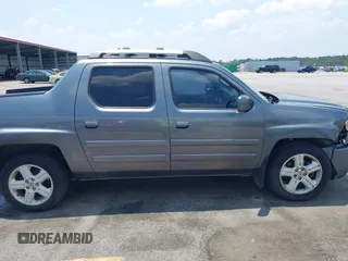 2013 Honda Ridgeline RTL with VIN 5FPYK1F5XDB012354, listed as a IAAI auction lot 42392921 with 248,223 mi miles and . Bid and sale history available at DreamBid. Image 13.
