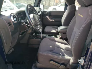 2013 Jeep Wrangler Sahara with VIN 1C4AJWBG3DL516842, listed as a Copart auction lot 49246065 with 129,594 mi miles and Salvage title. Bid and sale history available at DreamBid. Image 7.