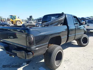 1998 Dodge Ram 1500 with VIN 1B7HF13Z7WJ145413, listed as a IAAI auction lot 42030706 with 198,080 mi miles. Bid and sale history available at carsss.com. Image 4.