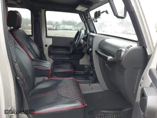 2007 Jeep Wrangler Unlimited X with VIN 1J4GA391X7L107424, listed as a IAAI auction lot 41752013 with 196,557 mi miles. Bid and sale history available at carsss.com. Image 5.