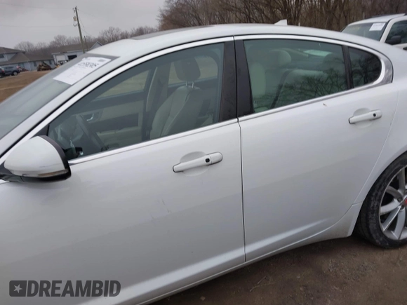 2015 Jaguar XF V6 Portfolio with VIN SAJWJ0FF2F8U59934, listed as a IAAI auction lot 41558305 with 120,219 mi miles. Bid and sale history available at carsss.com. Image 14.