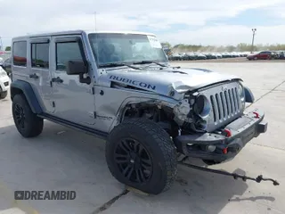 2015 Jeep Wrangler Unlimited Rubicon Hard Rock with VIN 1C4HJWFG6FL762537, listed as a IAAI auction lot 41792066 with 125,829 mi miles and . Bid and sale history available at DreamBid. Image 1.