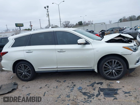 2020 Infiniti QX60 Pure with VIN 5N1DL0MN7LC545576, listed as a IAAI auction lot 41615817 with 62,858 mi miles and . Bid and sale history available at DreamBid. Image 13.