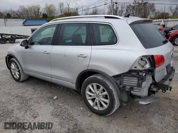 2013 Volkswagen Touareg Lux with VIN WVGEF9BPXDD004537, listed as a Copart auction lot 79277734 with 105,091 mi miles and Salvage Title. Bid and sale history available at DreamBid. Image 2.
