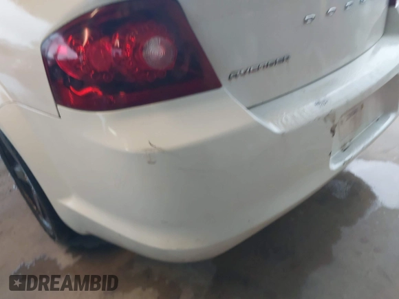 2013 Dodge Avenger SE with VIN 1C3CDZAB1DN712729, listed as a IAAI auction lot 41980859 with 250,356 mi miles and . Bid and sale history available at DreamBid. Image 14.